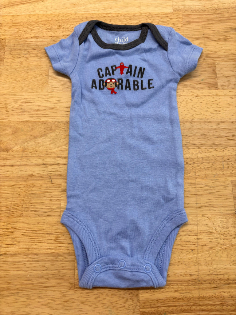 Child of Mine by Carter’s NB Bodysuit – Blue Captain Graphic