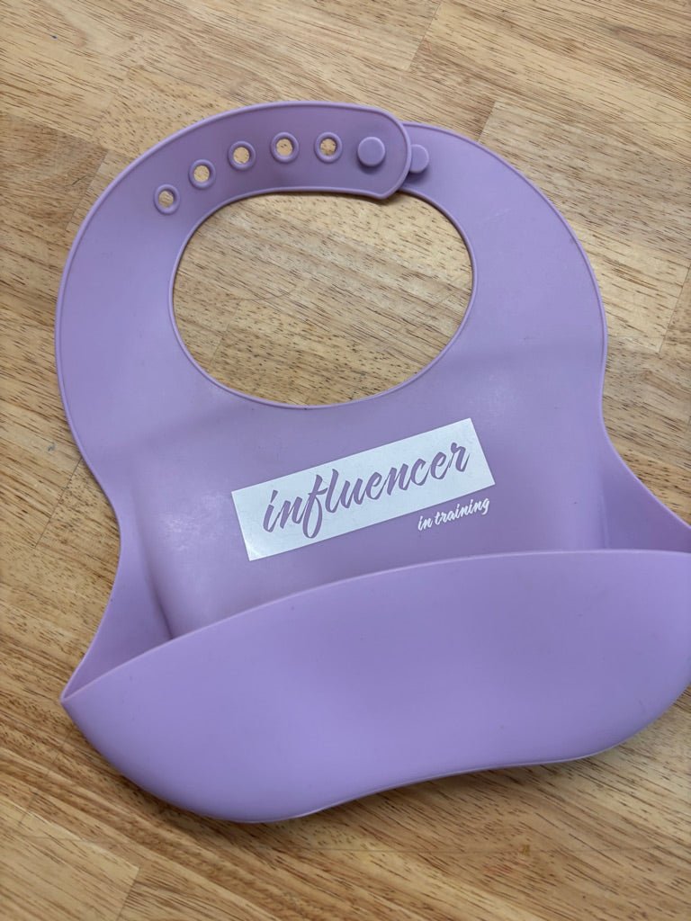 Purple Silicone Bib – “Influencer in Training” - Nest and Sprout - Consignment