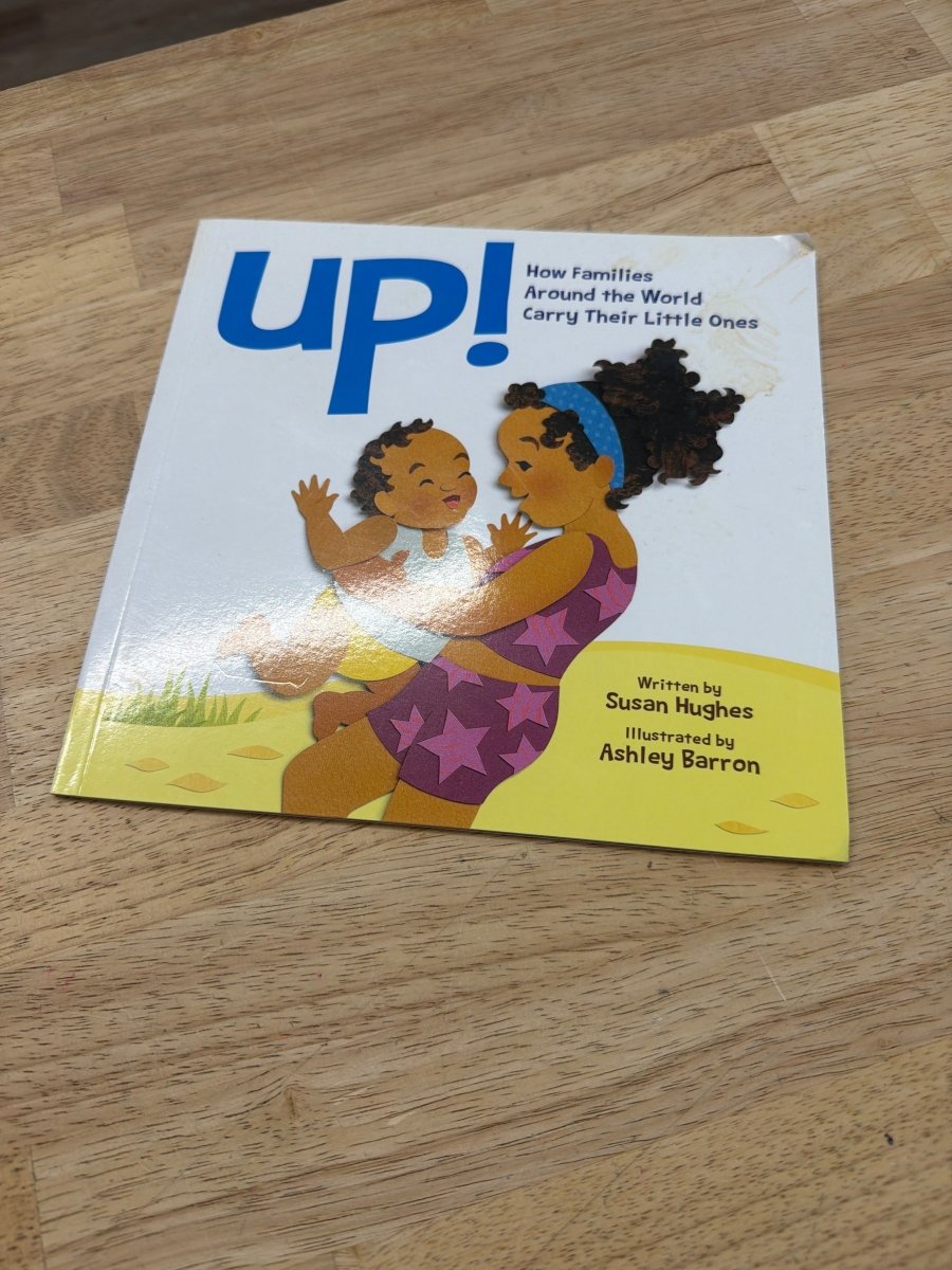 Used: Up! How Families Around the World Carry Their Littles – Susan Hughes - Nest and Sprout-Consignment