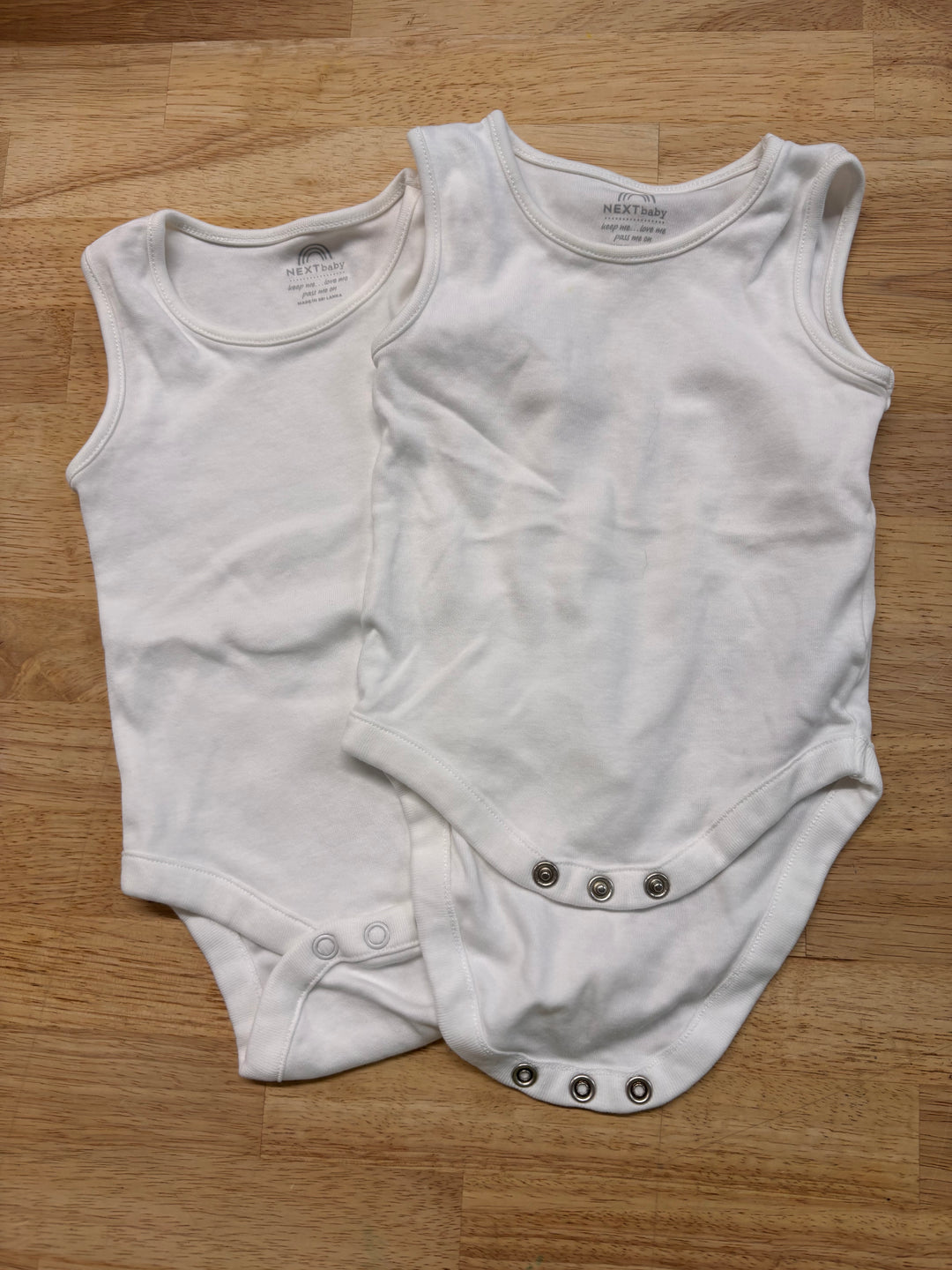Next Baby Bodysuit – 3-6M White Sleeveless