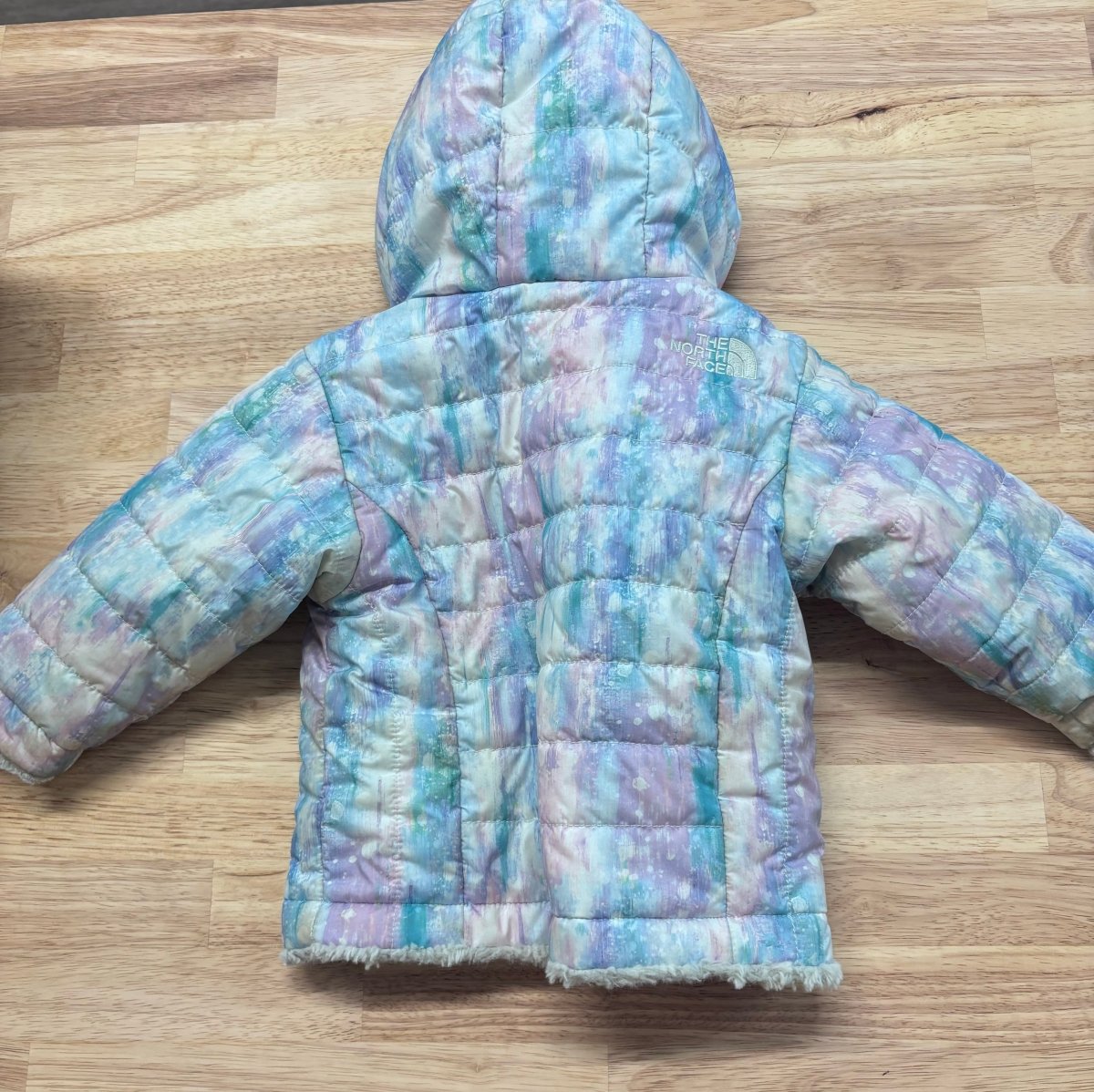 The North Face Reversible Mossbud Jacket – Size 12M – Pink & Purple Watercolour - Nest and Sprout-Consignment