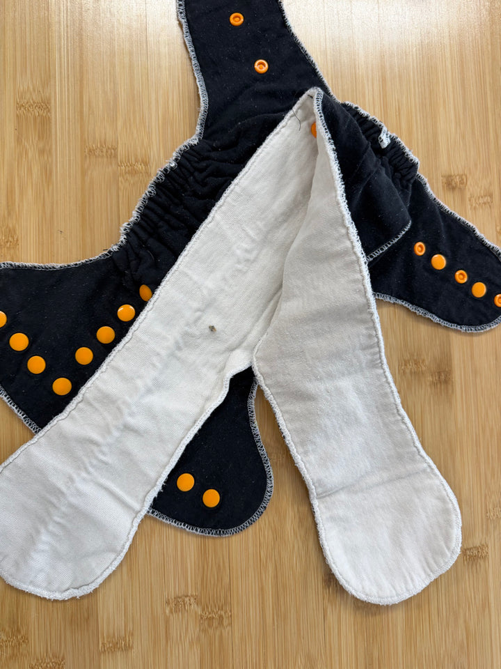 Fitted Cloth Diaper – One Size | Black Allover Graphic Snap-In Booster