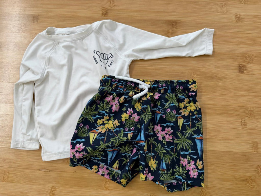Old Navy Two-Piece Swim Set – 6–12M | Tropical Sailboat Shorts & White Long Sleeve Rash Guard | Play - Nest and Sprout-Consignment