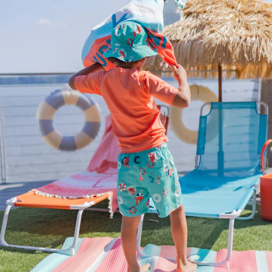 Blue swim bermuda shorts with flamingo all over print