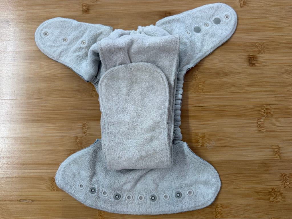 TC Tooshies Fitted Cloth Diaper – One Size | Light Grey Antler Print Snap-In Booster | Play