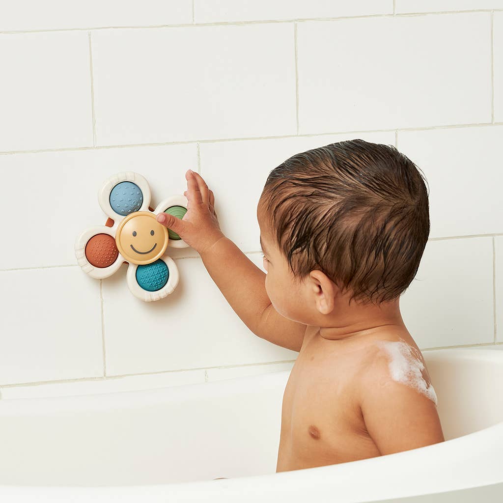 Itzy Pop & Whirl™ - Bath + Travel Toy | Smile