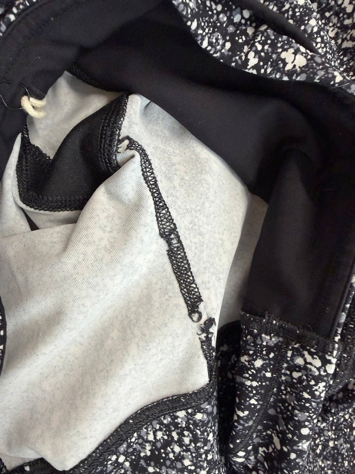 Lululemon Outrun 17" Crop in Splatter White Black / Black – 4 Adult | AS-IS Play - Nest and Sprout-Consignment