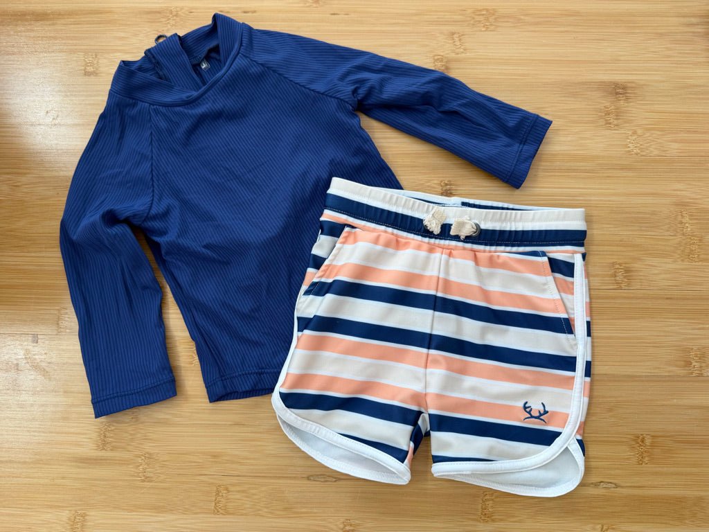 Little Buck Two-Piece Swim Set – 12–18M | Royal Blue Rash Guard & Blue/Orange Stripe Shorts - Nest and Sprout-Consignment