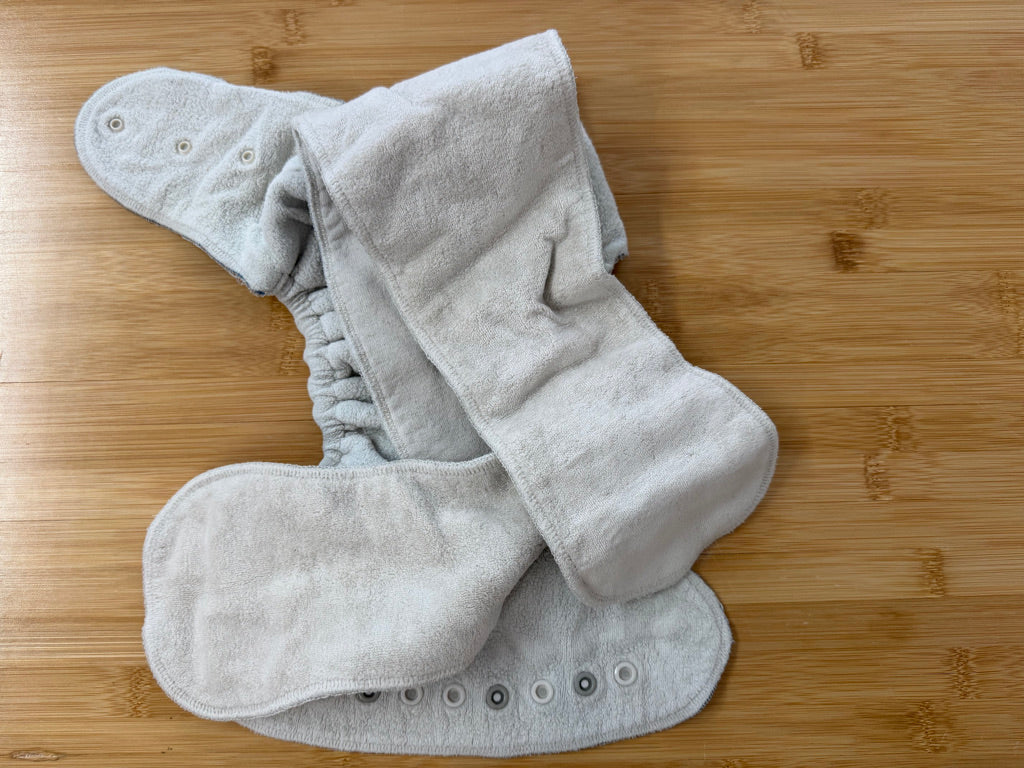 TC Tooshies Fitted Cloth Diaper – One Size | Light Grey Antler Print Snap-In Booster | Play