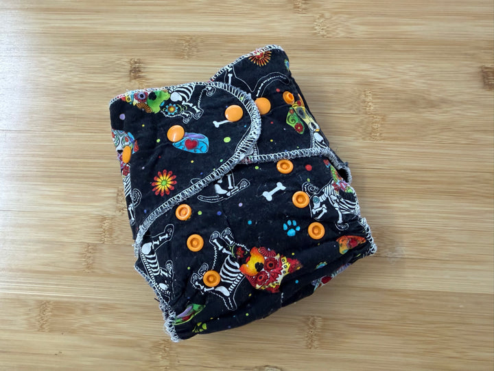 Fitted Cloth Diaper – One Size | Black Allover Graphic Snap-In Booster