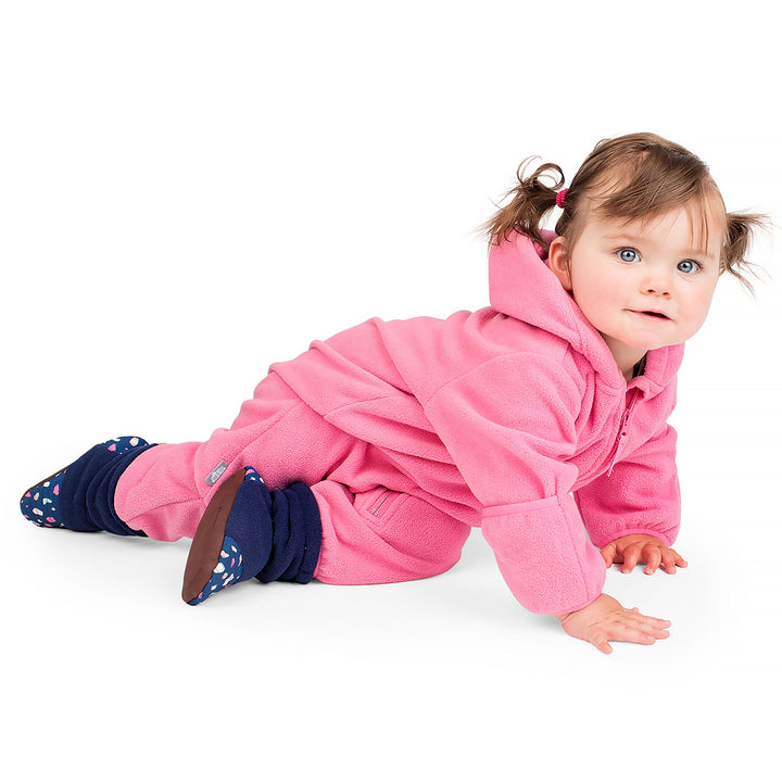 Baby crawling in a Jan & Jul Fleece Suit | Baby Outerwear in the colour watermelon pink