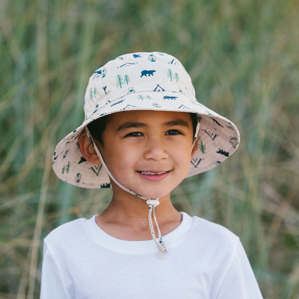 Child wearing Jan & Jul Cotton Bucket Hat in Bear Camp