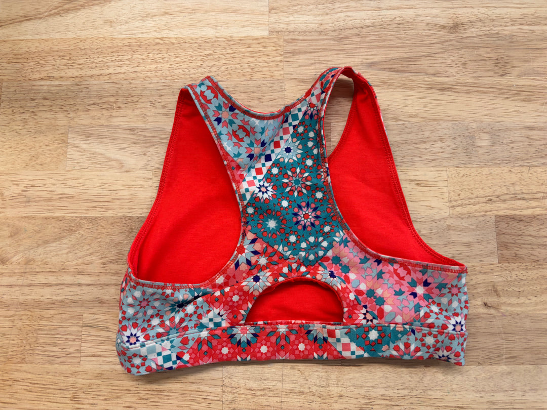 GapFit Sports Bra Youth Large (Bright Orange Geometric)