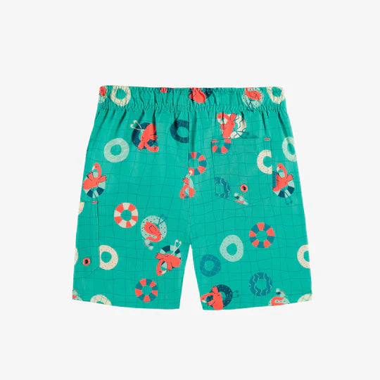 Blue swim bermuda shorts with flamingo all over print