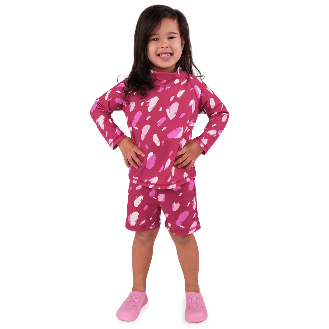 Front view of child wearing the Jan & Jul 2-pc UV Suit | Pink Petals. Child is wearing a 3T at 33lbs, 38.9 inches tall