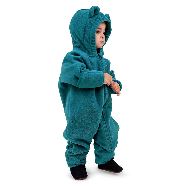 Toddler standing in the Jan & Jul Fleece Suit | Baby Outerwear in the colour way Blue Spruce