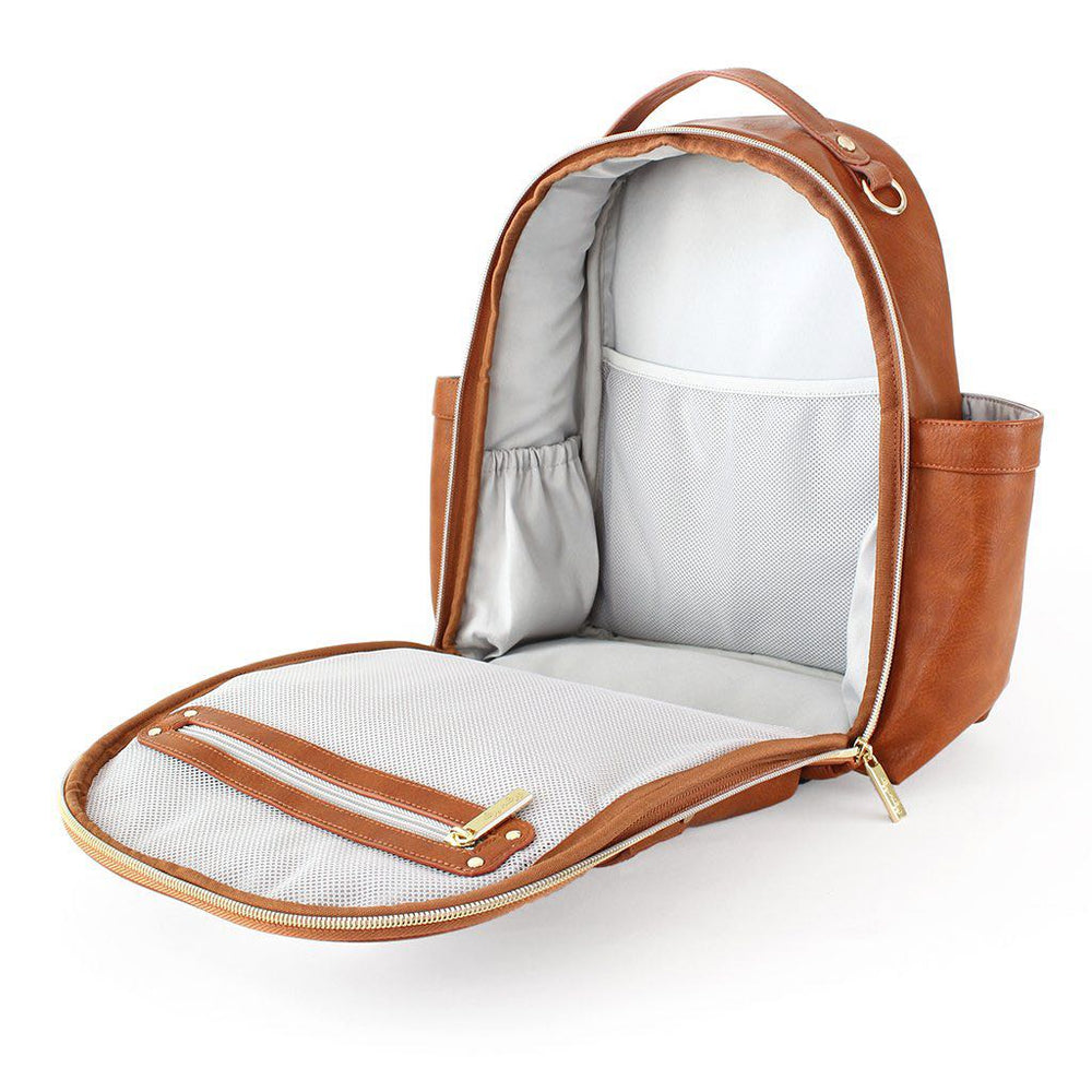 Inside view of the Itzy Mini™ Diaper Bag Backpack | Cognac