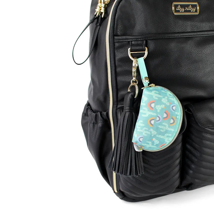 Itzy Ritzy Pacifier Pouch lifestyle view hanging on a diaper bag.