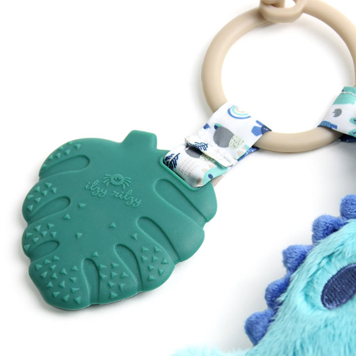 baby playing with Itzy Pal™ Plush + Teether