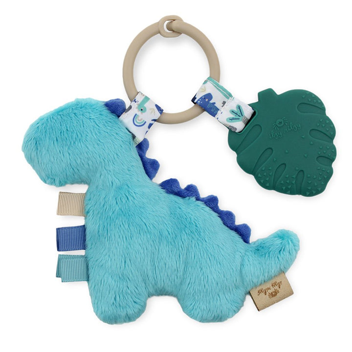 baby playing with Itzy Pal™ Plush + Teether